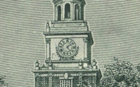 Изображение часов на башне Зала Независимости на купюре 100 долларов Изображение часов на башне Зала Независимости на купюре 100 долларов